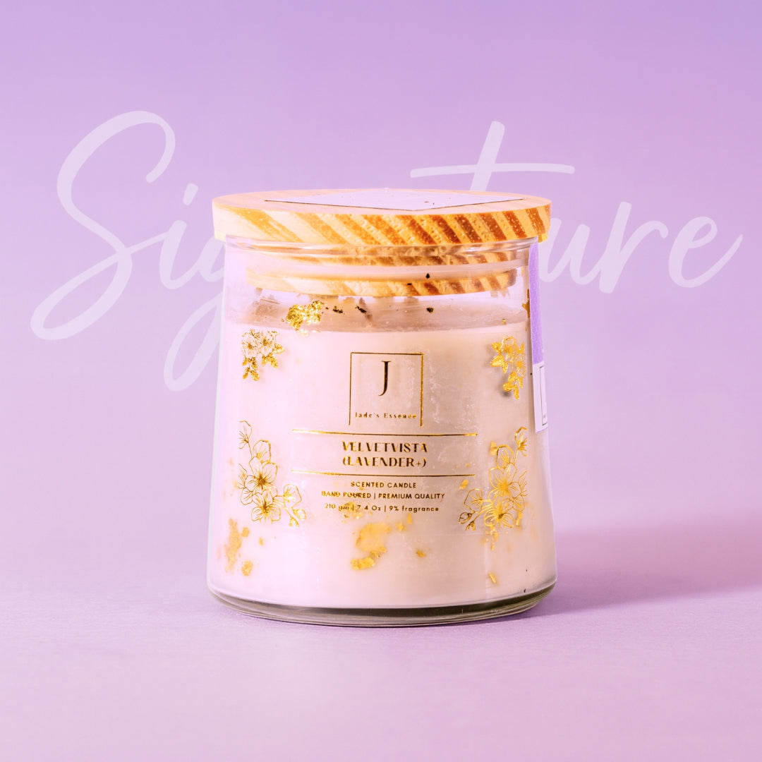Jar eco friendly candle with floral design on a purple background, featuring the brand jade's essence.