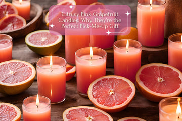 “Hand-poured pink grapefruit candles from Jade’s Essence in elegant holders, radiating a vibrant citrus aroma.”