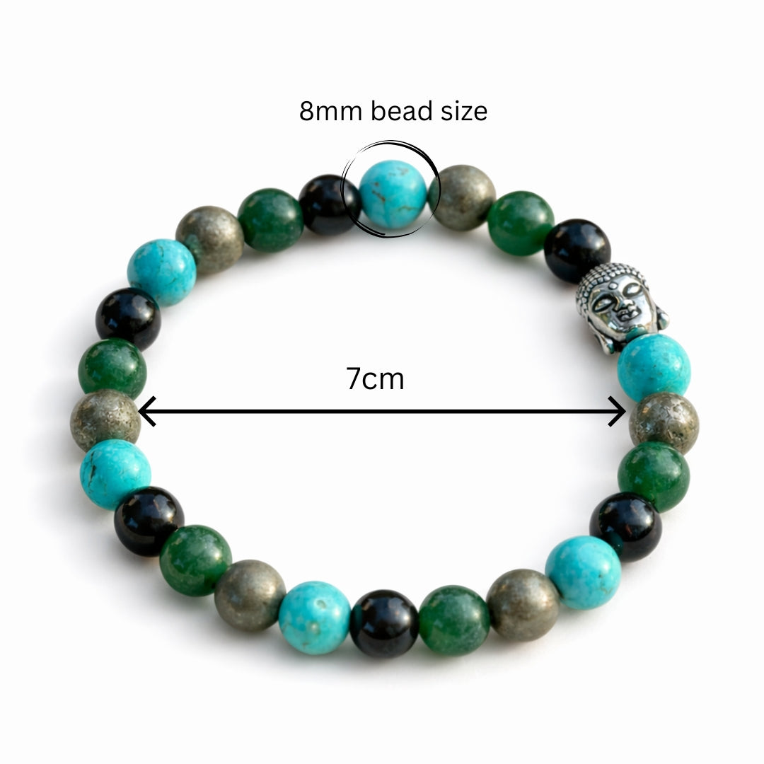 Beaded bracelet with turquoise and black beads on a beige fabric background