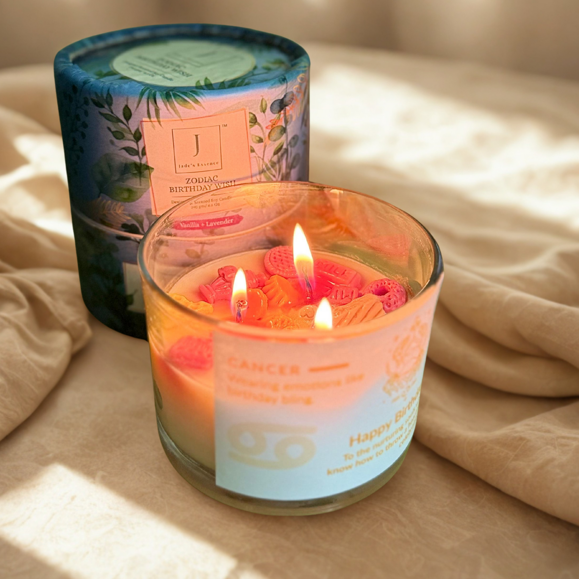 Zodiac ecofriendly candle with decorative packaging on a soft surface