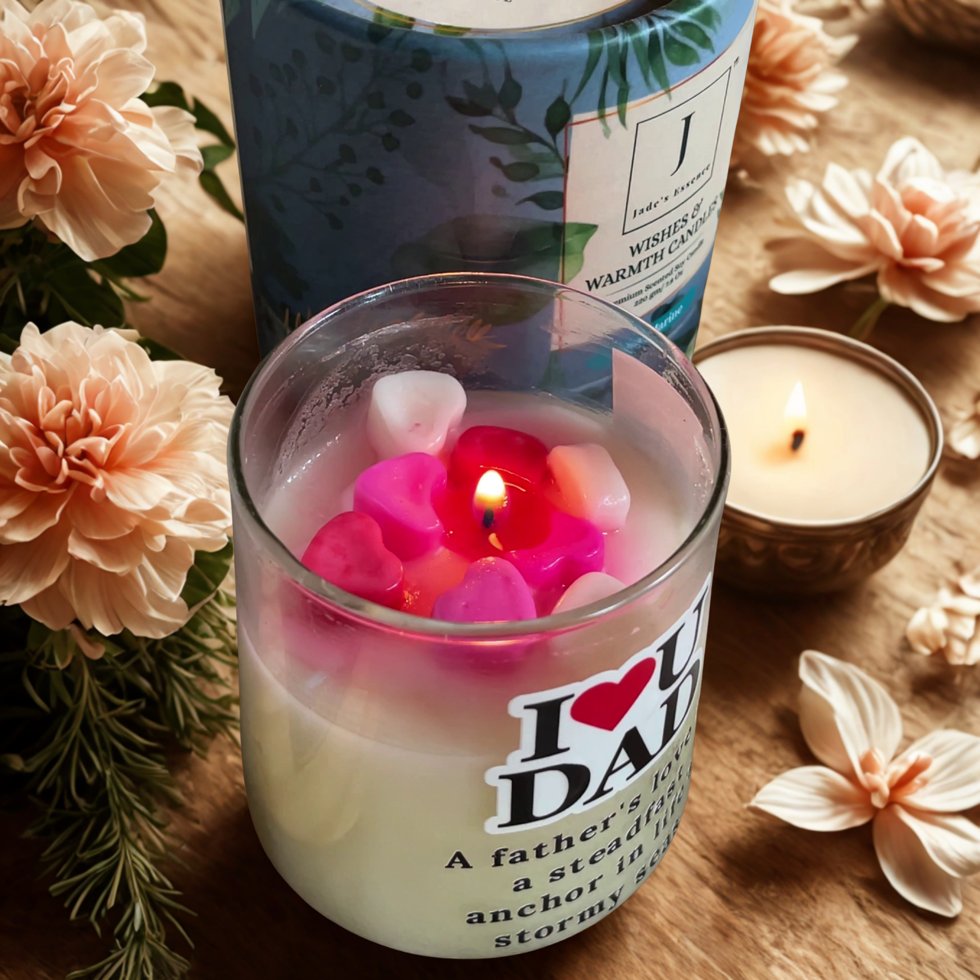 Eco friendly candle gifting with 'I love Dad' message and floral design on a wooden surface with flowers.