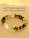 Dhan Yog Bracelet with Tiger Eye, Pyrite, Citrine, and Aventurine on a beige background