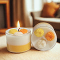 Decorative candle with floral design on a wooden surface, eco friendly 