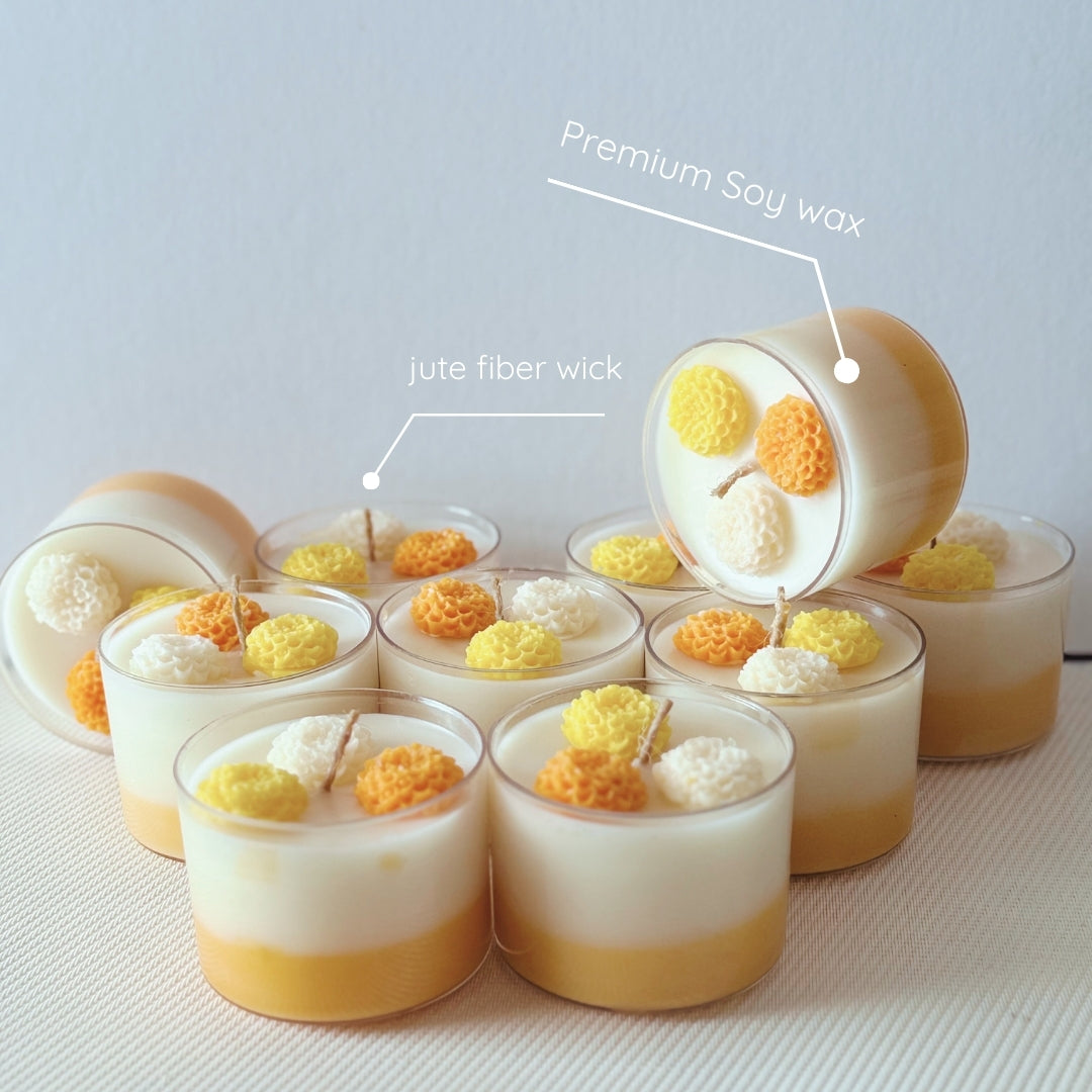 Set of small candles with decorative elements on a light background. eco friendly