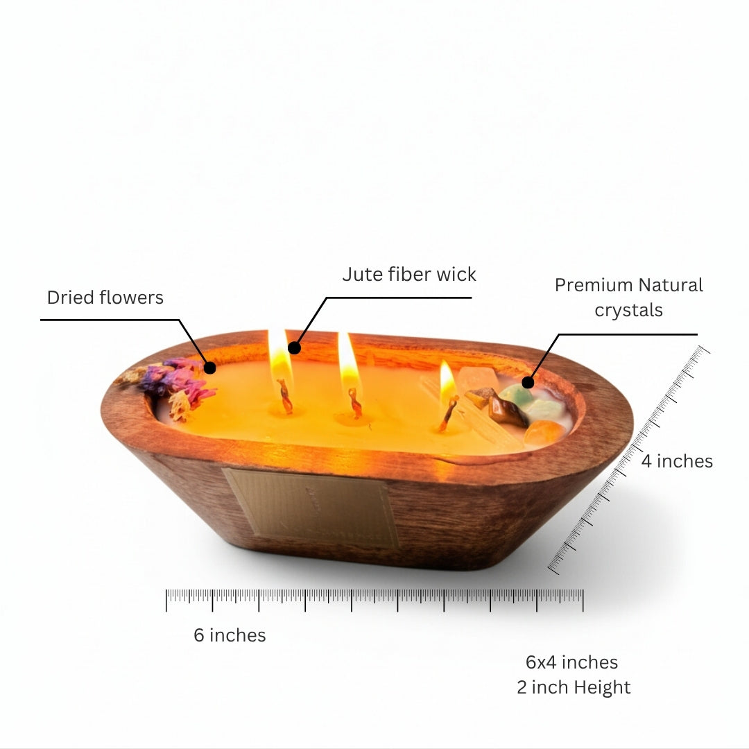 Three-wick candle in a wooden holder on a neutral background