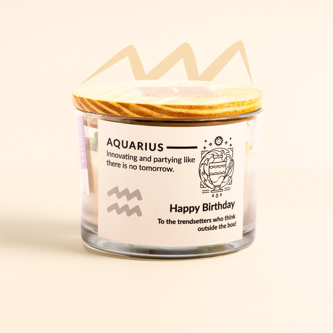 ecofriendly Candle in a glass jar with a wooden lid, featuring an Aquarius zodiac label on a beige background.